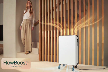 Duux FlowBoost, le radiateur Edge Oil diffuse la chaleur dans un salon